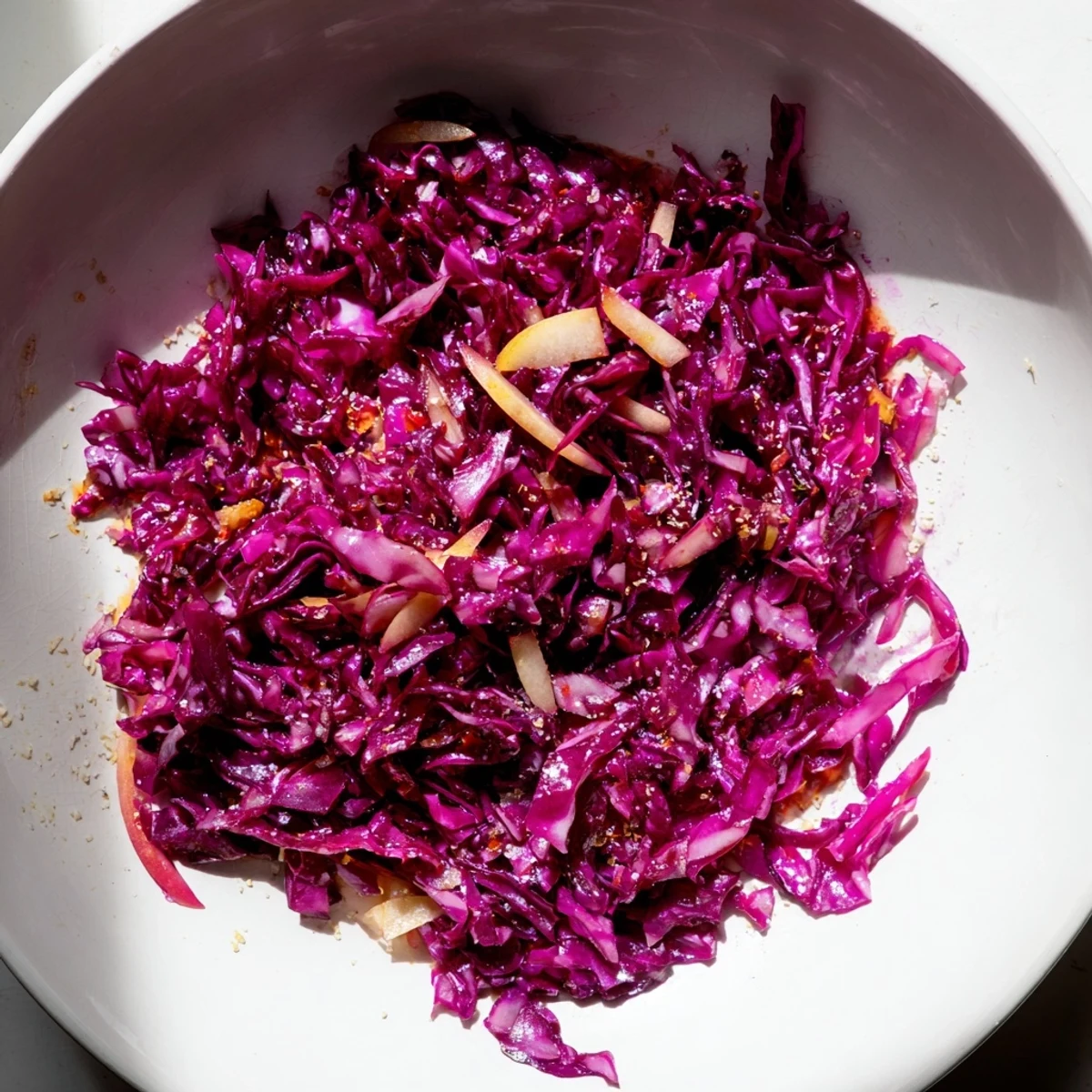 Steaming plate of savory Bavarian Red Cabbage and Apple, a flavorful German side dish.