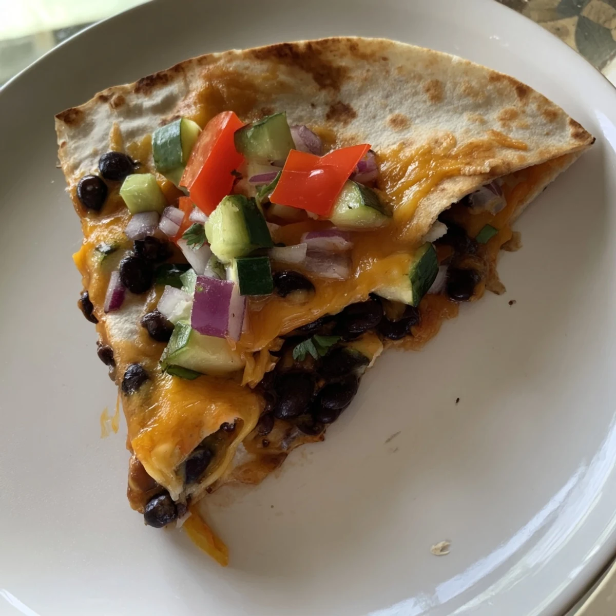 Vegetarian Quesadillas with melted cheese, beans, and colorful veggies, a quick and delicious meal.