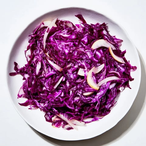 Simmering Bavarian Red Cabbage and Apple side dish, showcasing vibrant color and tender texture.