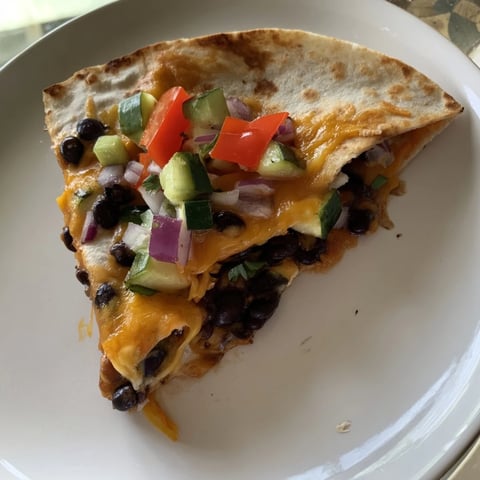 Vegetarian Quesadillas with melted cheese, beans, and colorful veggies, a quick and delicious meal.
