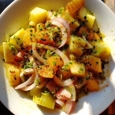 Crisp cucumber and tinned fish salad, glistening with olive oil, ready for a date night.