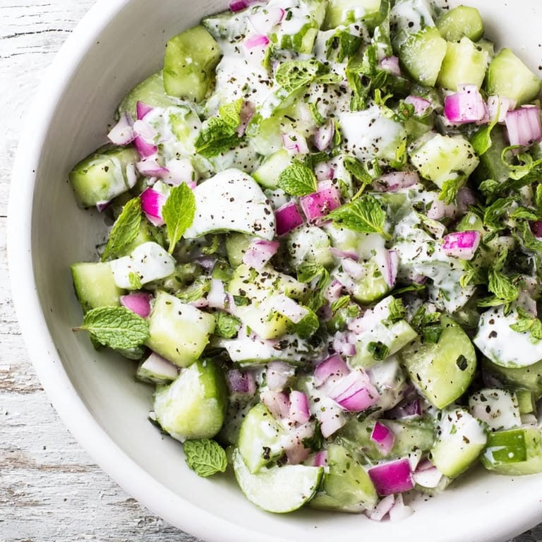 Picture a close-up of this delicious Cucumber and Greek Yogurt Tzatziki Salad, perfect for summer.